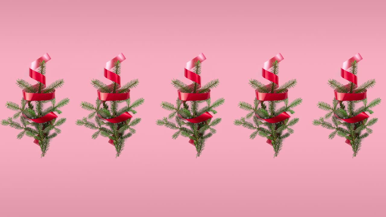 seamless pattern animation of five spruce branches and red curly ribbons, funny movement in different directions. Christmas tree concept with copy space on pink pastel background