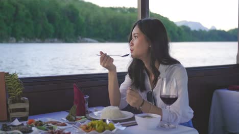Asian Girl Eating Food On Boat, Video In 4K
