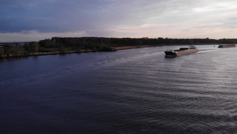 Freighter-Of-Excelsior-Shipping-Navigates-The-River-In-Barendrecht-At-Daytime