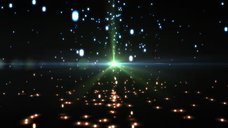 manchas brillantes de luz que se mueven contra un fondo negro