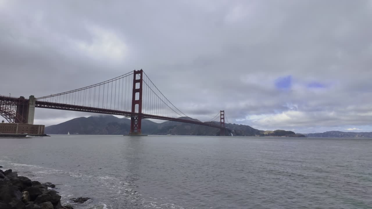View of Golden Gate Bridge from Marine Drive in San Francisco on a cloudy day
