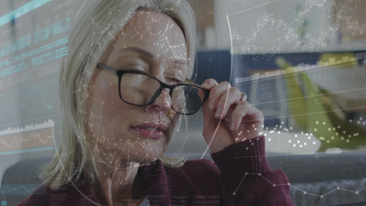 Adjusting glasses, woman interacting with animation on transparent screen in school