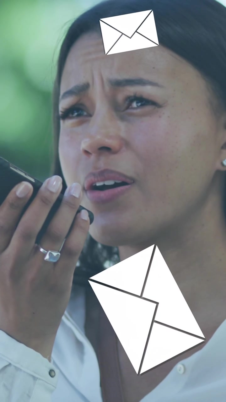 Animation of envelope mail icons falling over woman talking on smartphone