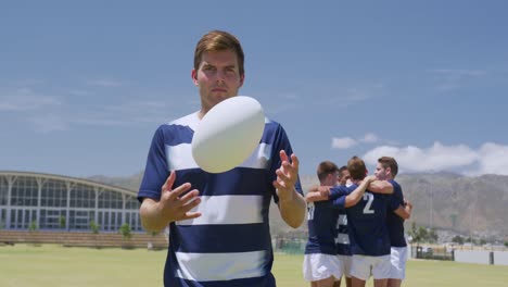 Rugby-players-standing-with-ball