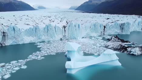 breathtaking aerial view of glacial icebergs and serene waters in a majestic glacier landscape, capturing nature's raw beauty and tranquility across vast expanses