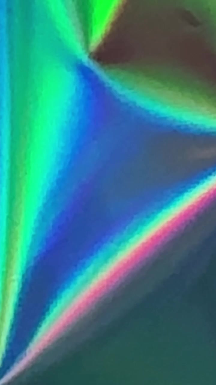 Texture astratta di lamina olografica che si muove e riflette la luce