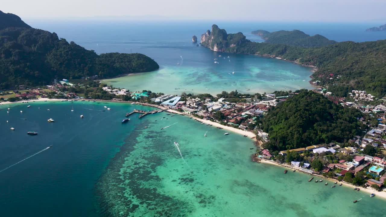 Aerial Moving Hyperlapse View Over Ton Sai Beach In Koh Phi Phi, Krabi Thailand With Boats Coming And Going
