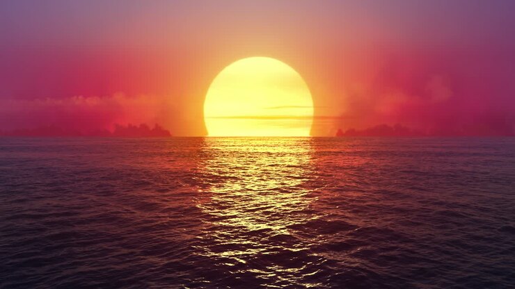 Seamlessly looped flight over ocean at fantasy sunset.