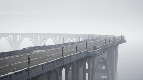 misty bridge over foggy landscape