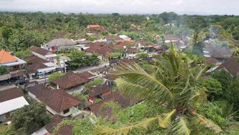 drone view of indonesian housing and road in batubulan, gianyar, bali