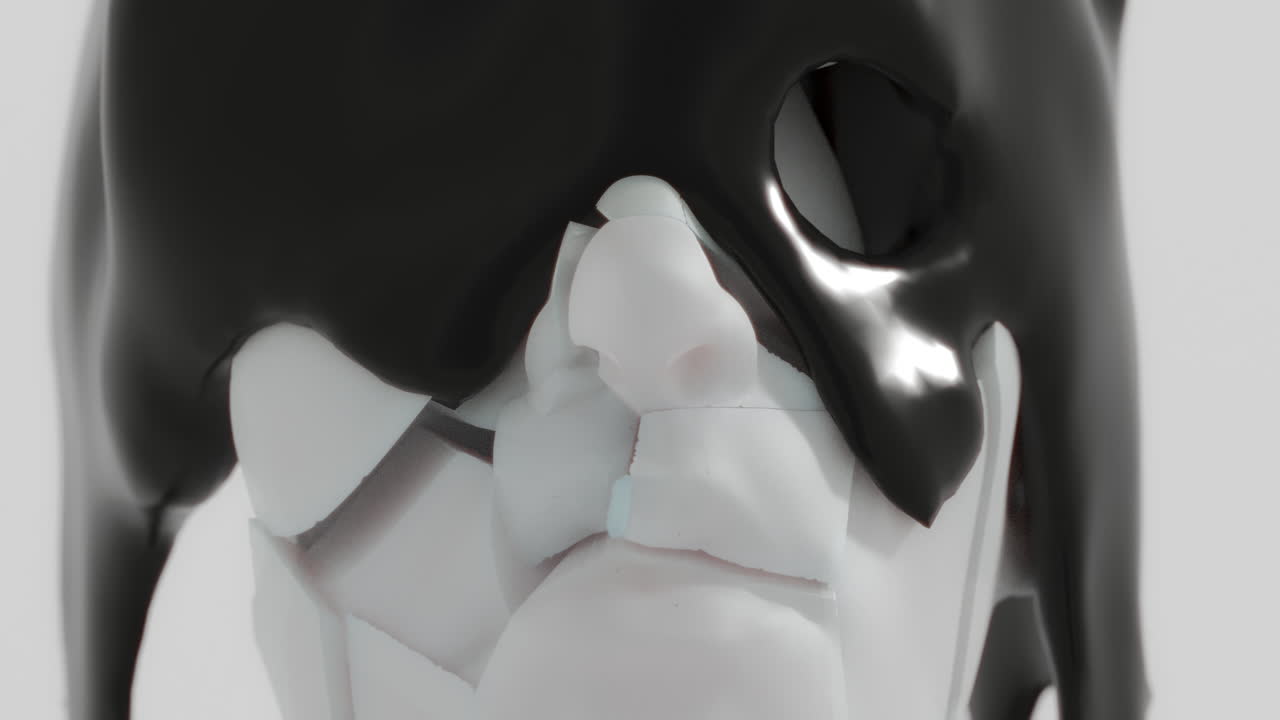 A black liquid metal flows slowly on the sculpture