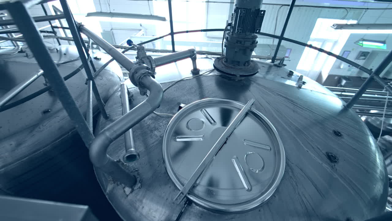 Factory for production of butter. Production of butter at milk production factory. Motion view