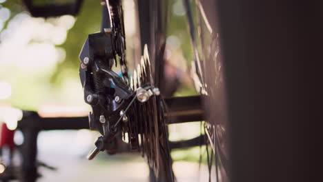 person repairing bicycle wheel