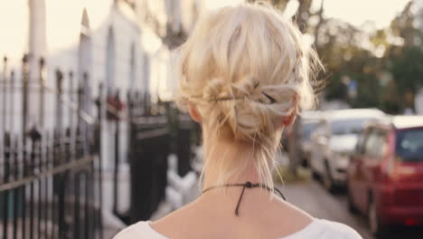 woman walking down a city street