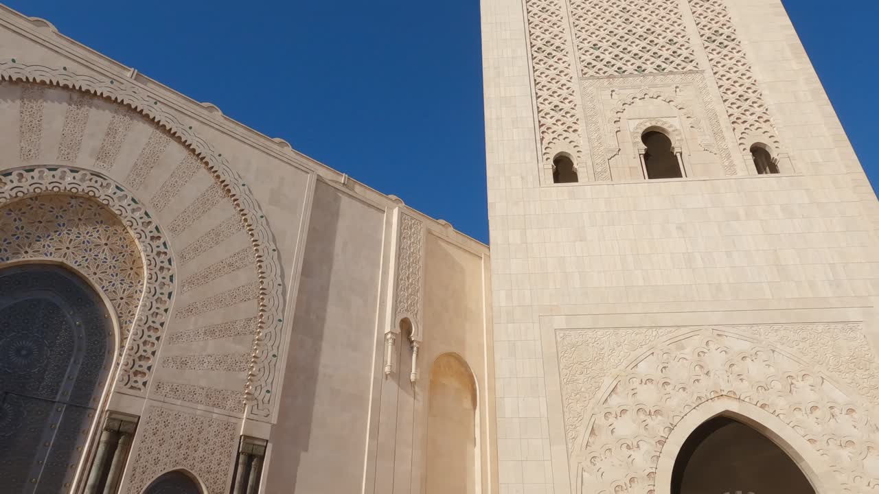 Hassan II Mosque's entrance gate to towering minaret, Casablanca, Morocco