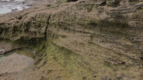 limestone rockpool showing chemical erosion over time