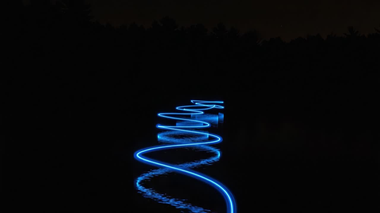 A Mesmerizing Display of Light Play on Water: Captivating Waves of Blue Shimmering Reflections Create a Hypnotic Scene Under the Night Sky