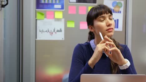 businesswoman working at desk in a modern office 4k