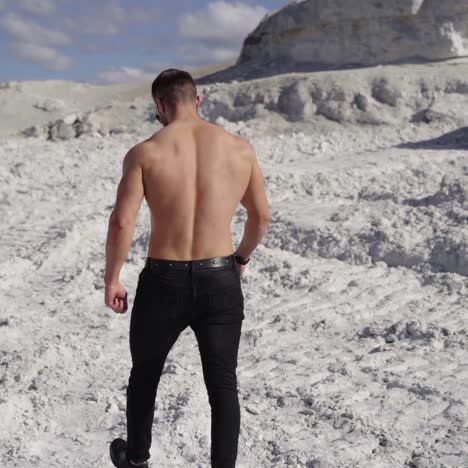 handsome shirtless muscular young man