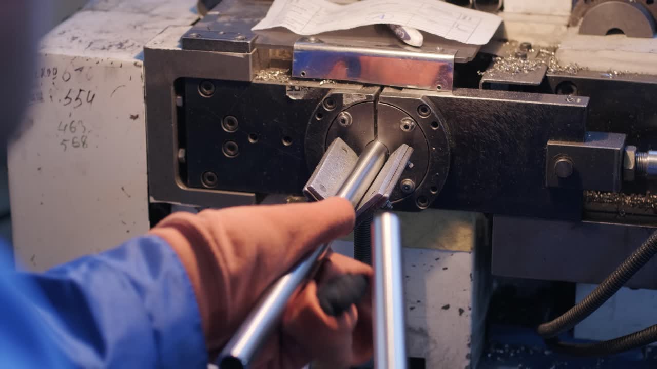 Modern industrial laser machine with CNC, Metal cutting technology. Laser cutting of steel pipes in a modern factory. Laser cuts holes in the pipe.