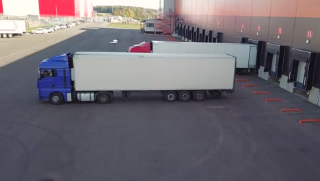 truck are parking to dock of logistics center