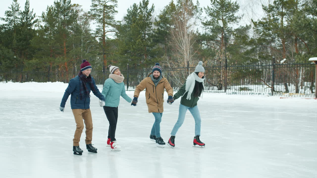 Friends Ice Skating in Winter Park