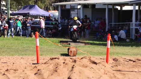 motorbike rider performing in front of spectators