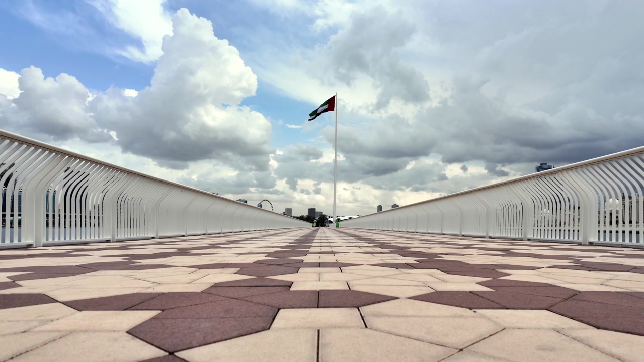 The UAE national flag waving in the air in the United Arab Emirates.
