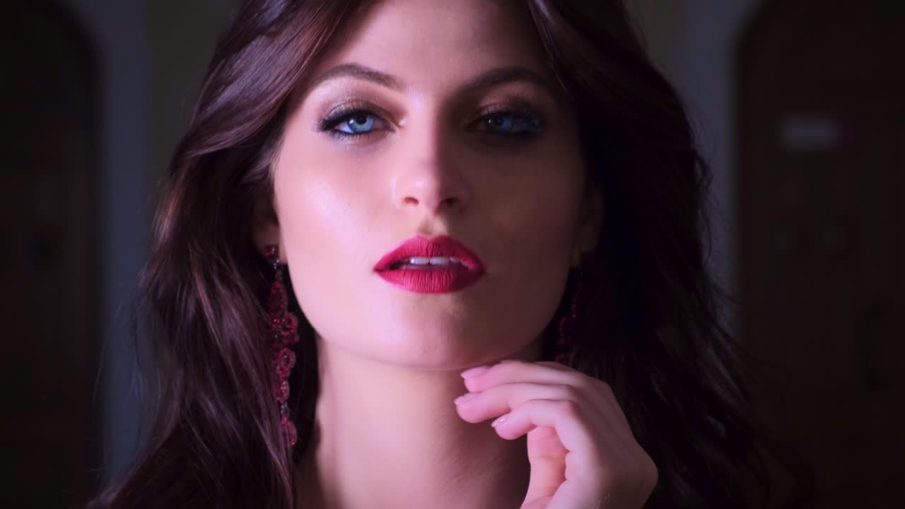 A Captivating Portrait of a Young Woman with Striking Features and Dramatic Lighting, Showcasing Elegance and Individuality in a Visually Stunning Composition