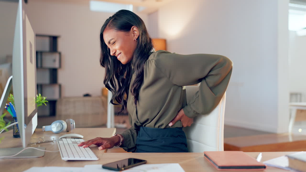 Back pain, office chair and woman working