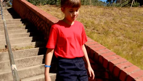 determined girl walking downstairs in boot camp