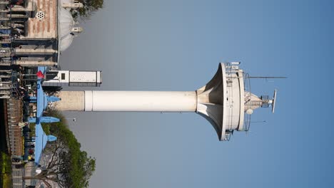 white tower in istanbul with cafe and historical building
