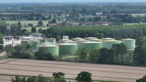 oil refinery plant at cloudy day.ecosystem and healthy environment concepts. lacchiarella, italy.footage at 50 fps