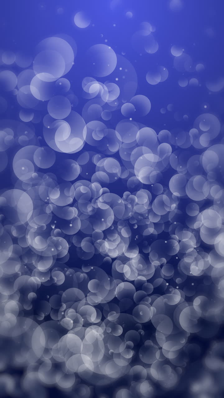 Pattern with white bubbles on blue background. Loop abstract animation. Vertical video.