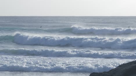 White-Waves-Rolling-In-The-Ocean---Surfing-Paradise---Palm-Beach-In-Gold-Coast,-Queensland,-Australia