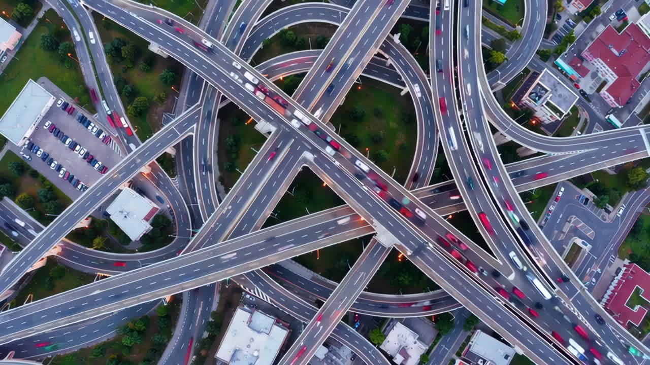 Aerial View of a Busy Multi-level Highway Interchange at Night