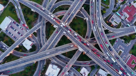 aerial view of a busy multi-level highway interchange at night