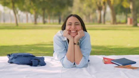 happy indian girl in a park