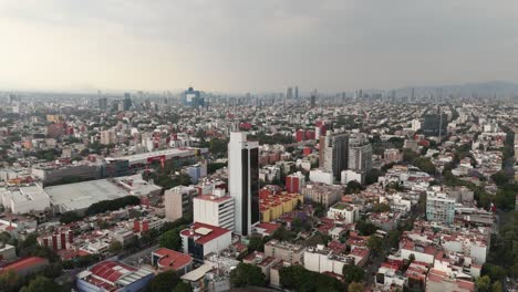 drone footage of mexico city on a cloudy and rainy day