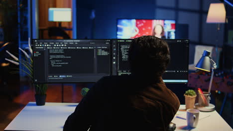 developer drinking coffee while writing lines of code on computer