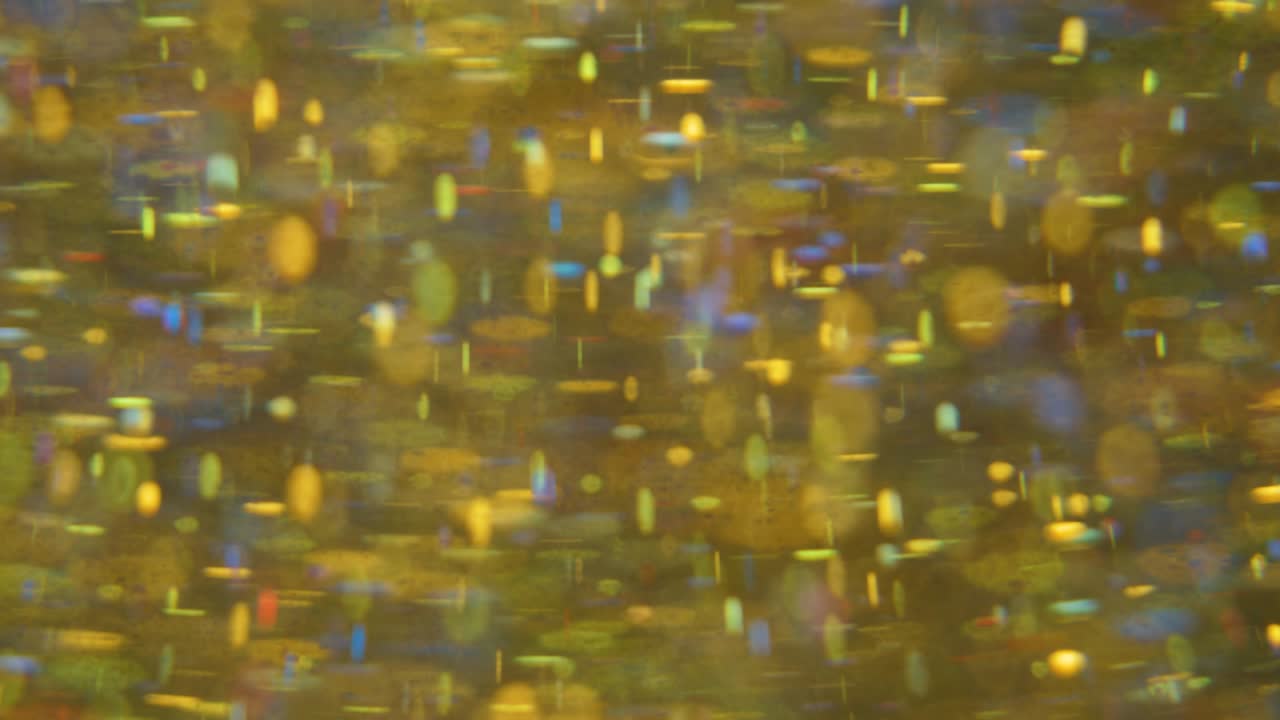 Bright Festive Retro Background. Chaotic Blurred Motion Particles.  Space Galaxy Planets. Surface Slow Motion. Bokeh Background Loop of Unique Bubble Vintage Lens Effects. Fantastic Surface.