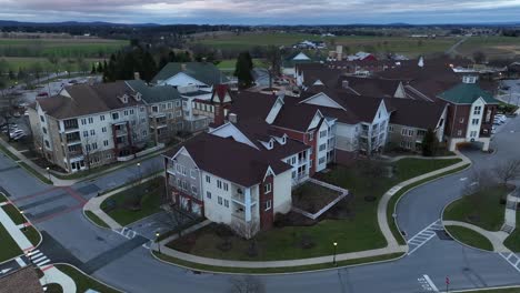 aerial orbit around retirement home on dark winter day