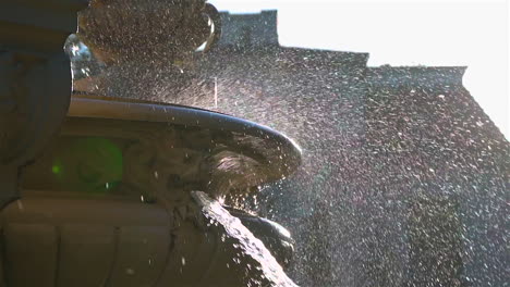 pretty morning light reflecting on the classical city fountain