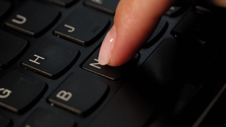 Pushing N button on the black keyboard