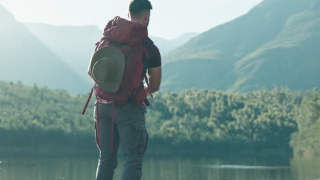 throw, rocks or man hiking by lake in nature