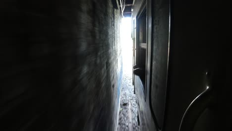 locomotive going through a bridge on yangon circle train