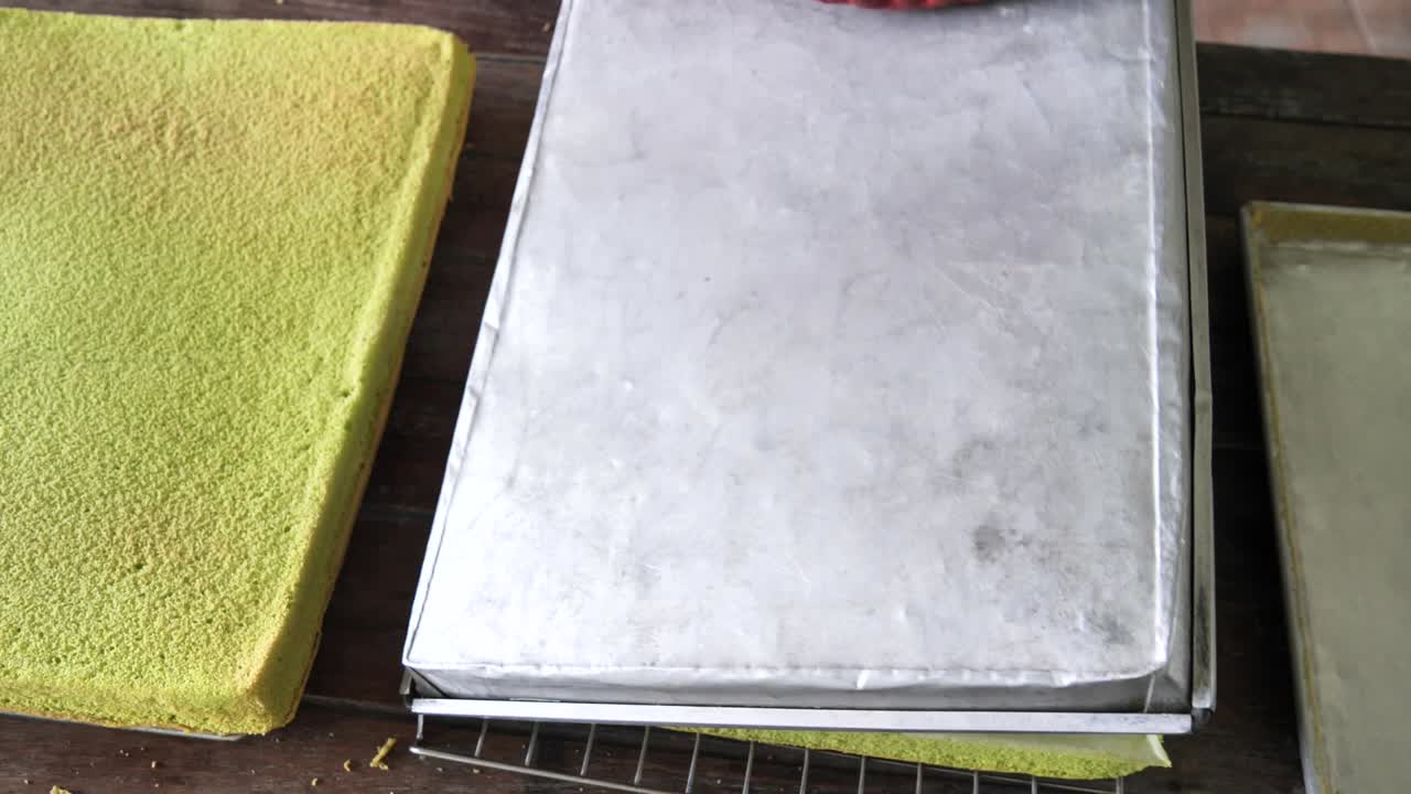 Processing sponge butter cream cake, food concept.
