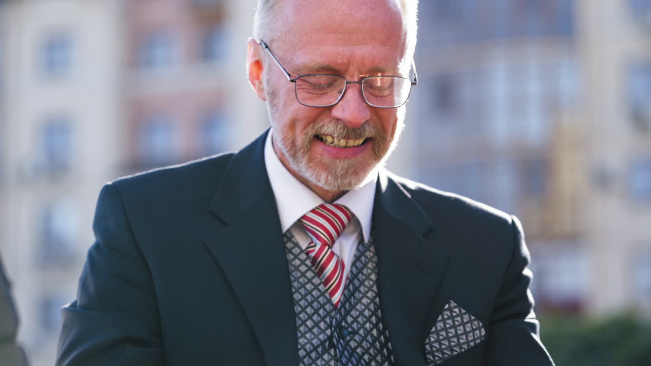 Happy man winner in game on phone. Crazy and funny face of bearded man winner in mobile game