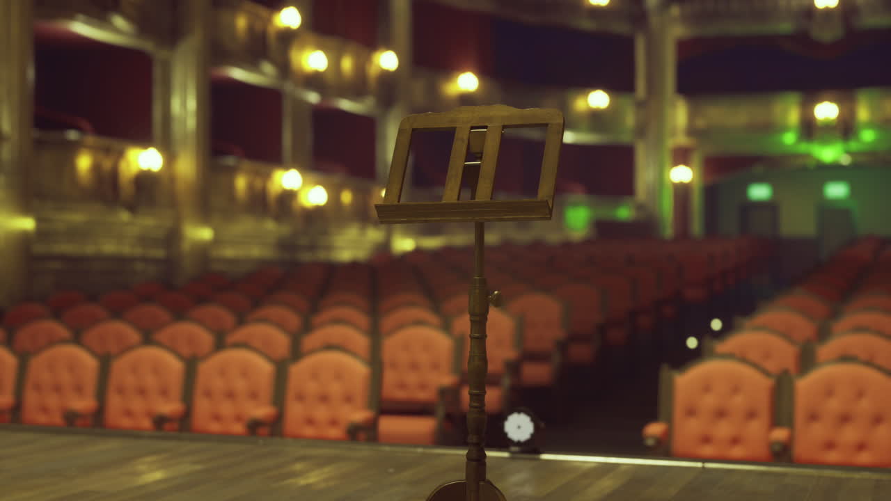 Empty theater with music stand ready for performance before audience arrival