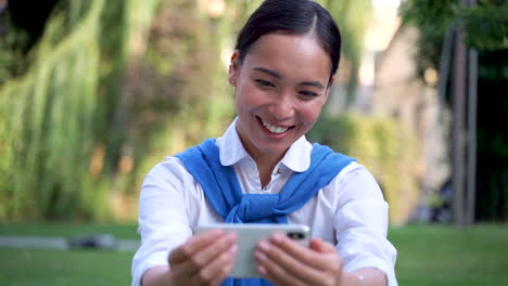 Woman-Taking-A-Selfie,-Winking-And-Sticking-Out-Her-Tongue-Outdoors